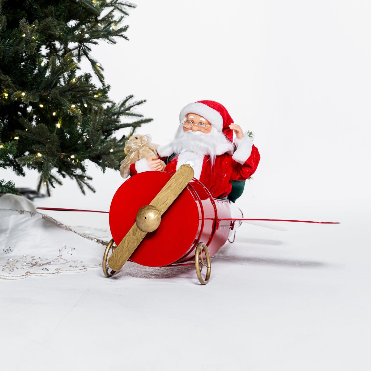 Santa In Plane Waving with Traditional Music Display Piece