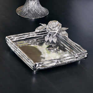 Metal napkin holder with antique rose detailing